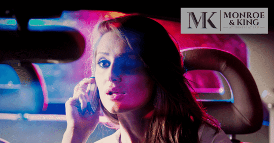 Woman on phone getting arrested