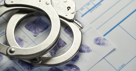 Handcuffs and fingerprints