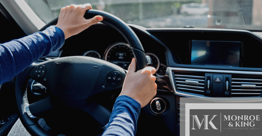 hands on steering wheel