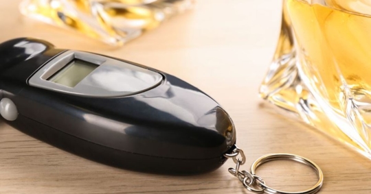 breathalyzer device by two glasses of liquor